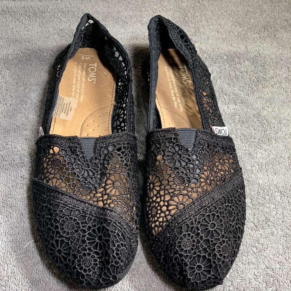 Black crochet slip ons